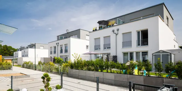 Rastatt semi-detached houses Modern semi-detached houses with flat roofs and green gardens